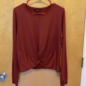 Zobha rust colored long sleeve athletic shirt